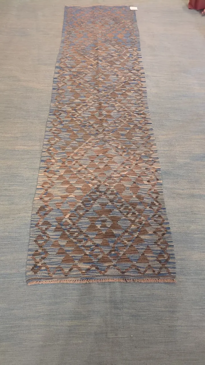 Kilim ancien, motifs sur fond bleu passé